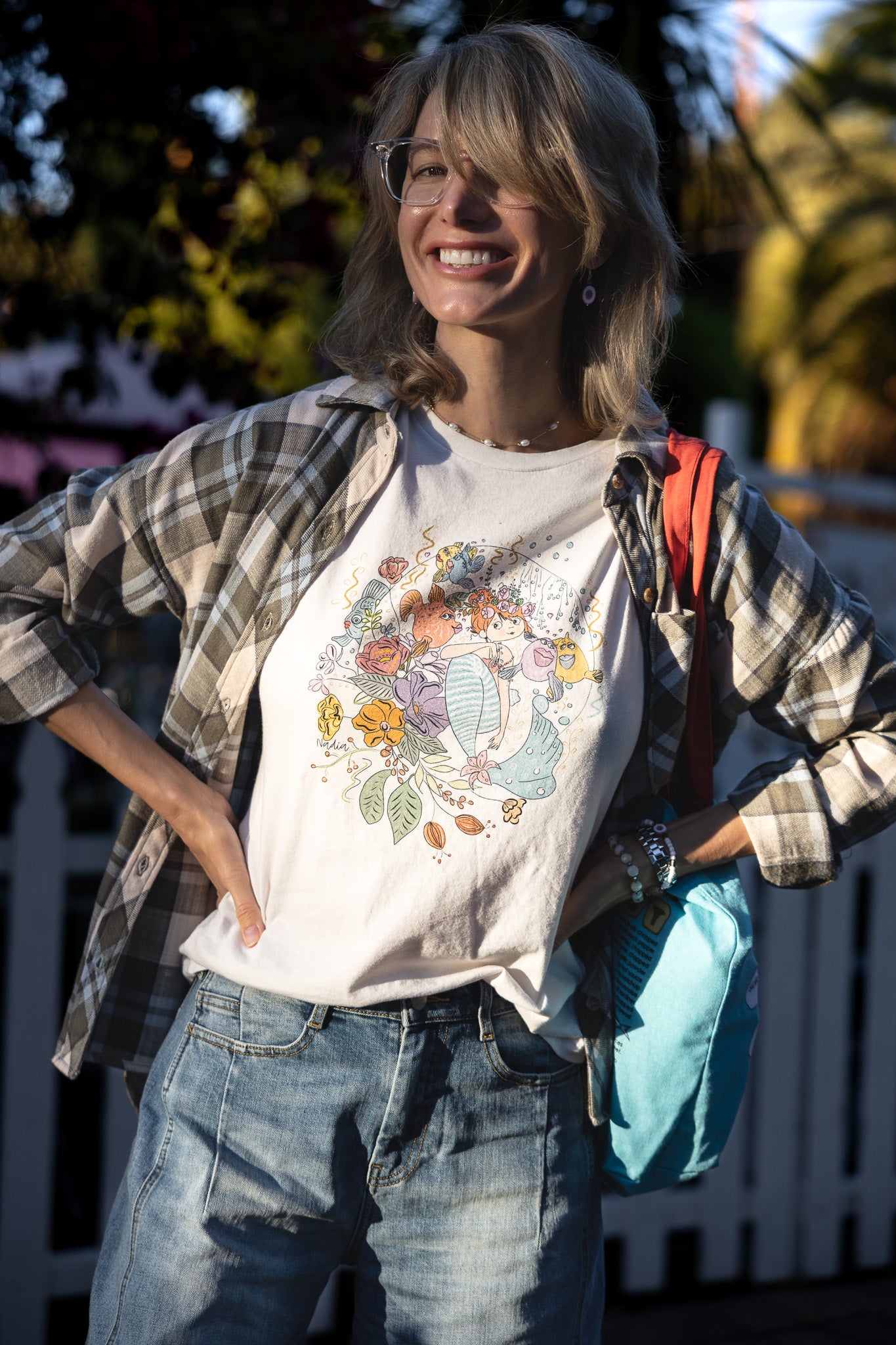 Mermaid with cute fish friends illustrated graphic tee for women