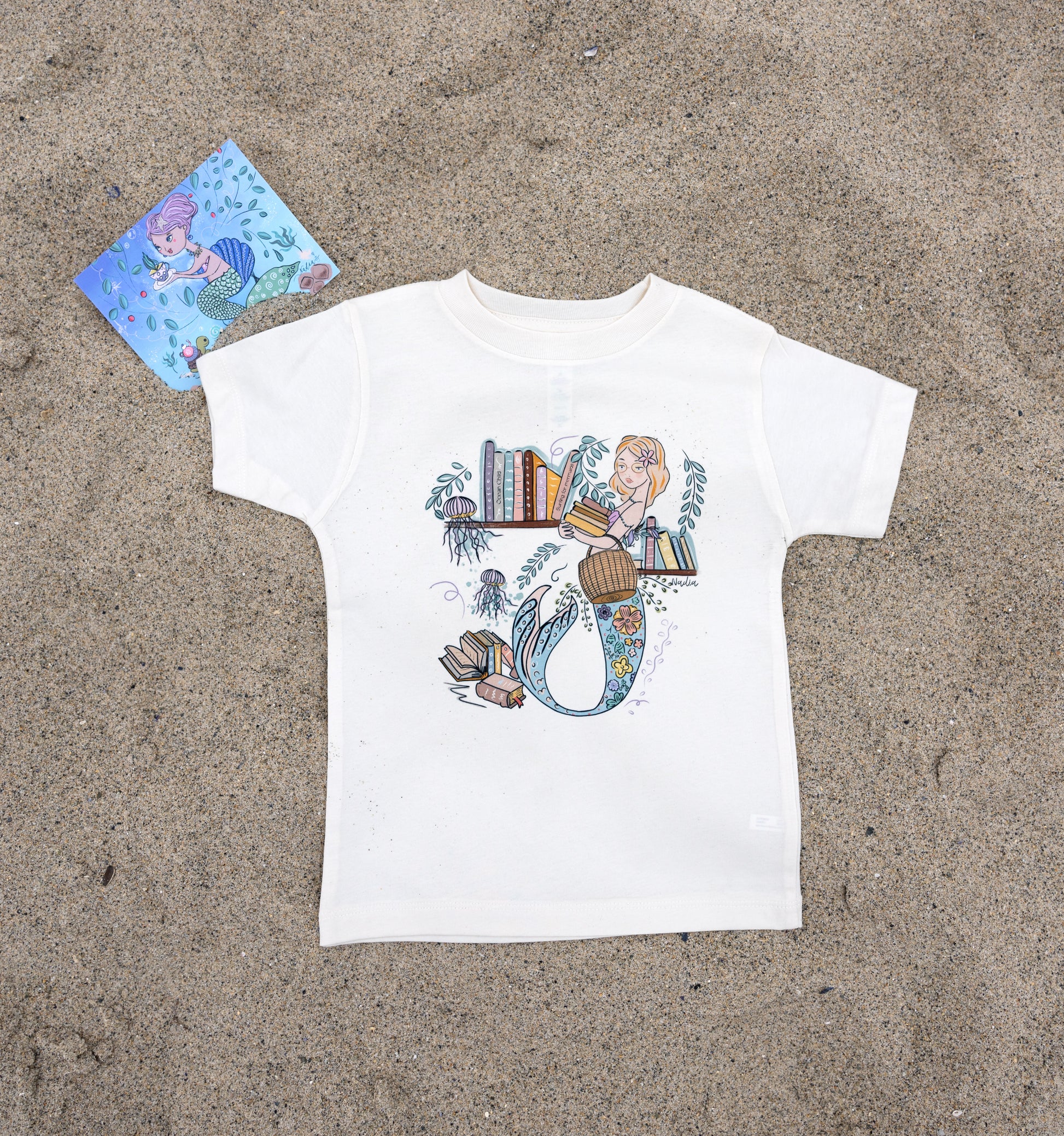 Illustrated mermaid holding books toddler t-shirt, Learn Dream Dive graphic tee, soft cotton, pastel colors