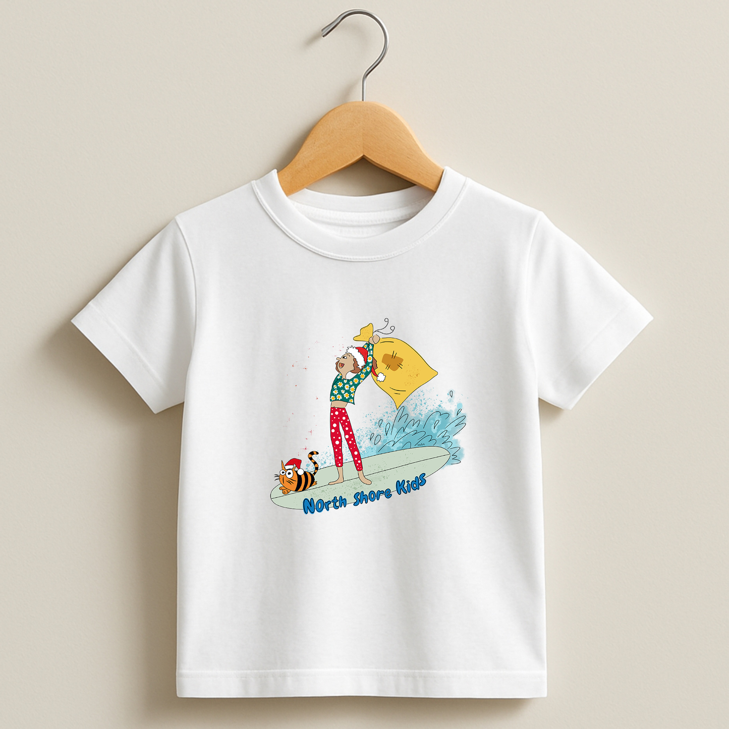 Toddler tee with a girl on a surfboard, cat, Santa hat and gift bag – holiday surf design