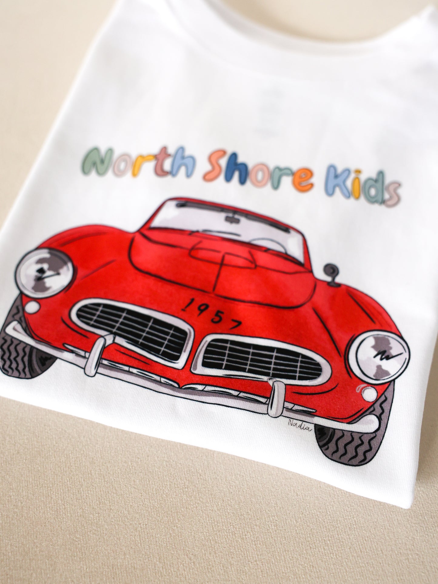 North Shore Kids Red classic roadster car illustrated by Nadia Watts