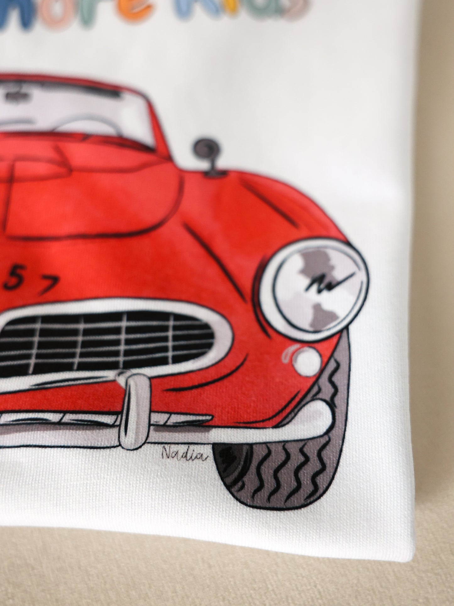 1957 red classic roadster illustrated graphic tee for kids