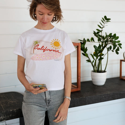 California License Plate with a surfboard Illustrated Graphic tee for women