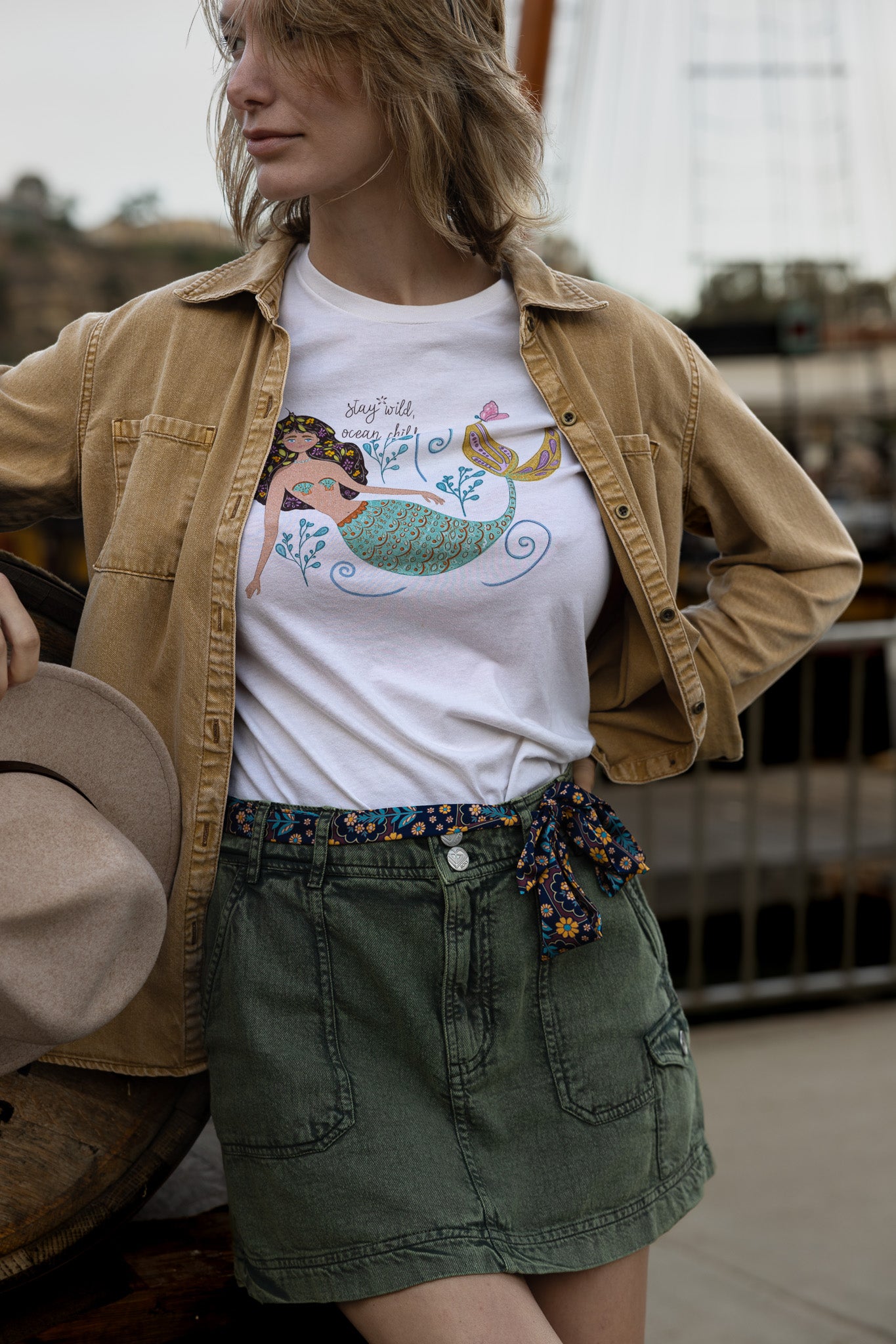 Stay wild ocean child hand-illustrated graphic tee featuring a lovely mermaid.