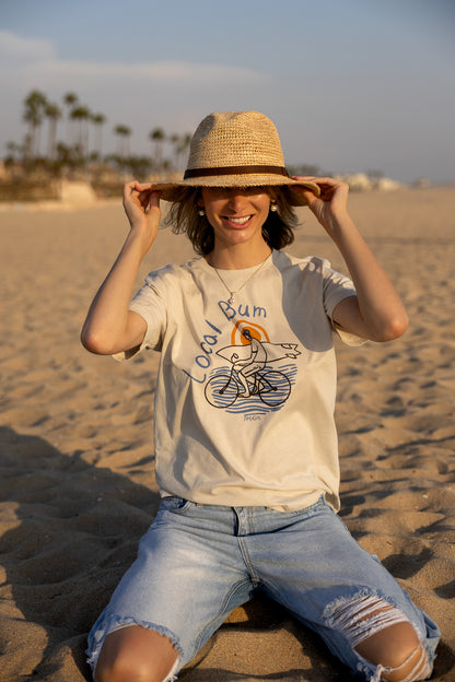 Woman is wearing Local Bum graphic tee for women