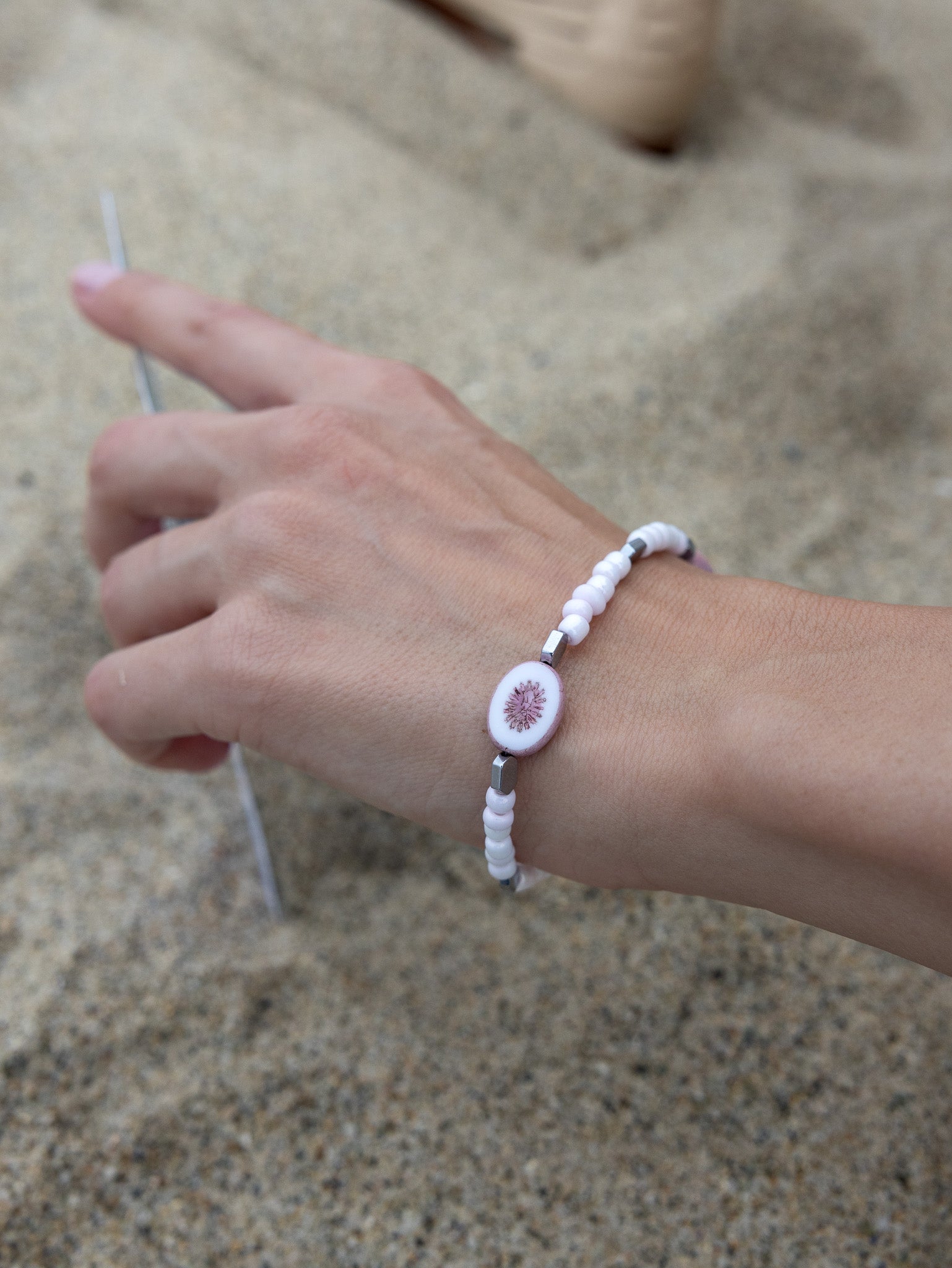 Simple stretchy bracelet with high-quality beads in soft pink hues