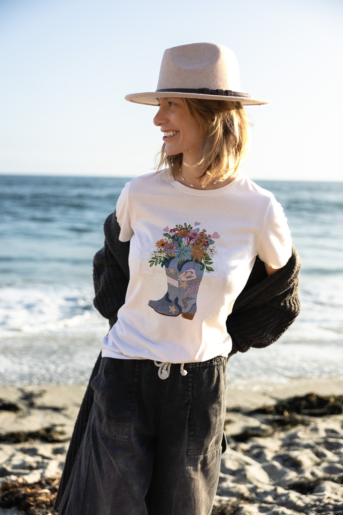 Cowgirl Mermaid illustration tee, women's relaxed fit with mermaid & flower design.