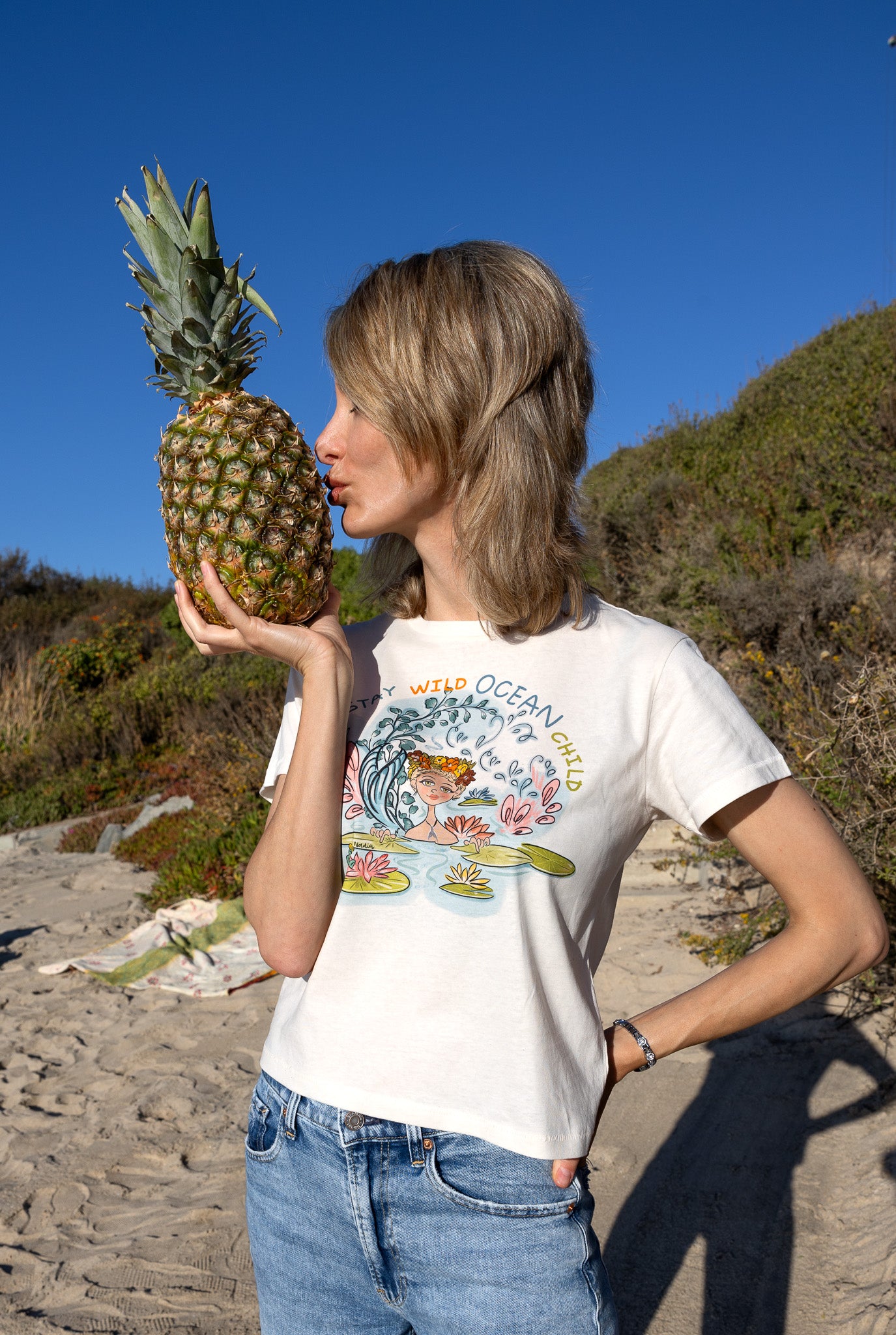 Mermaid graphic tee, hand-illustrated design, water lilies. Handmade shirt for women who love the ocean