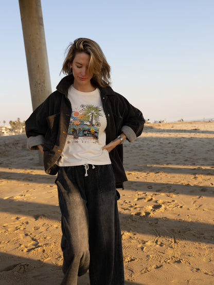 Hand‑drawn Mini Cooper with beach and bohemian accents on a soft cotton relaxed‑fit women’s tee