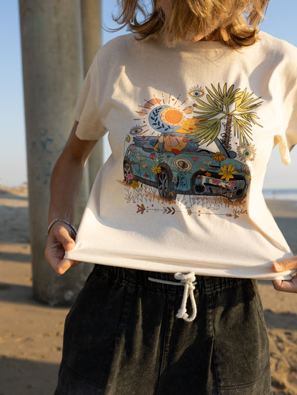 Hand‑drawn Mini Cooper with beach and bohemian accents on a soft cotton relaxed‑fit women’s tee