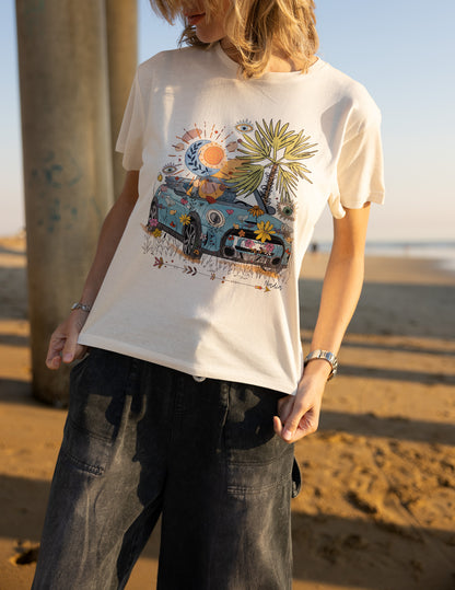 Hand‑drawn Mini Cooper with beach and bohemian accents on a soft cotton relaxed‑fit women’s tee