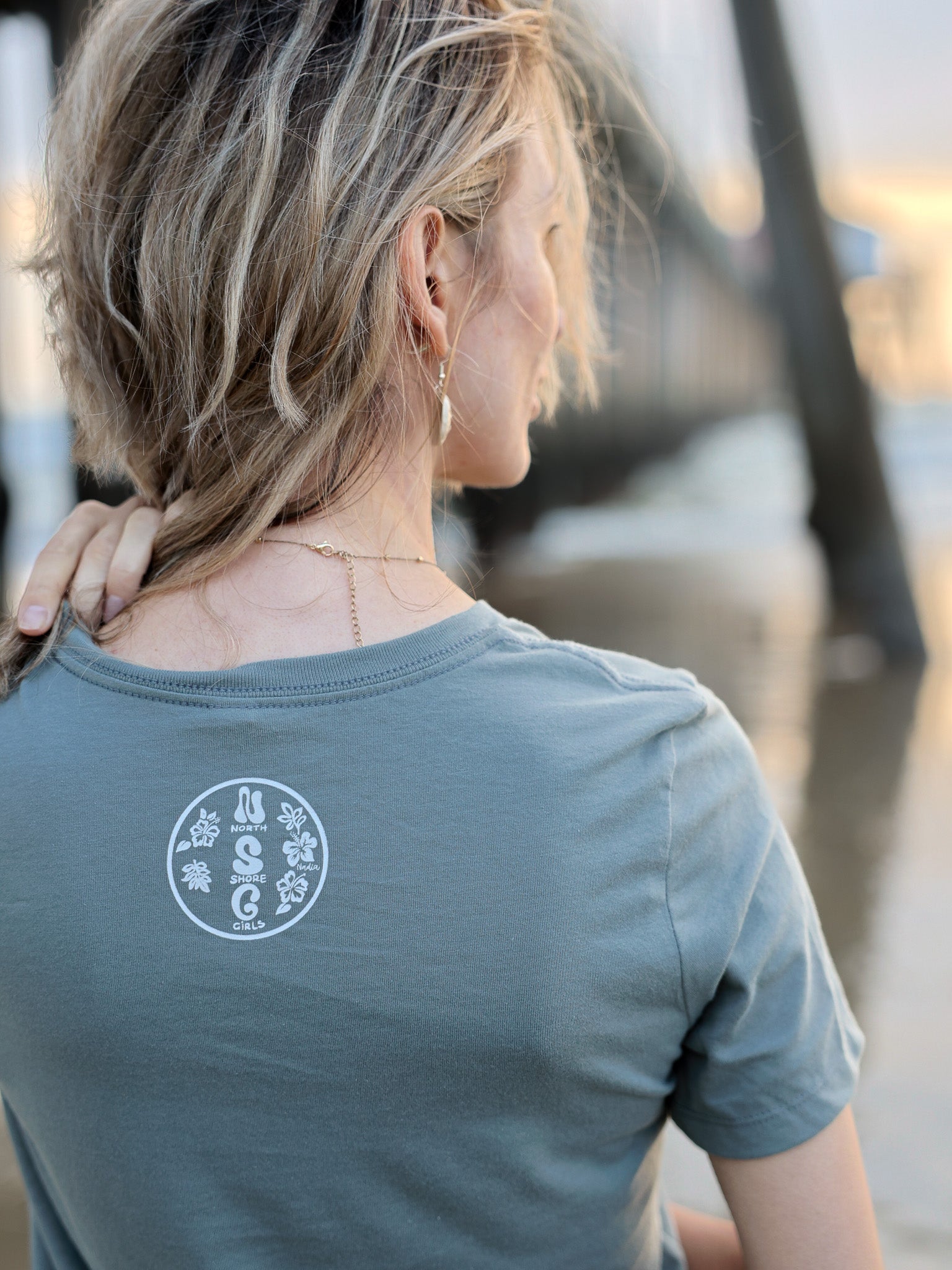 North Shore Girlsoriginal hand-drawn logo on a tee