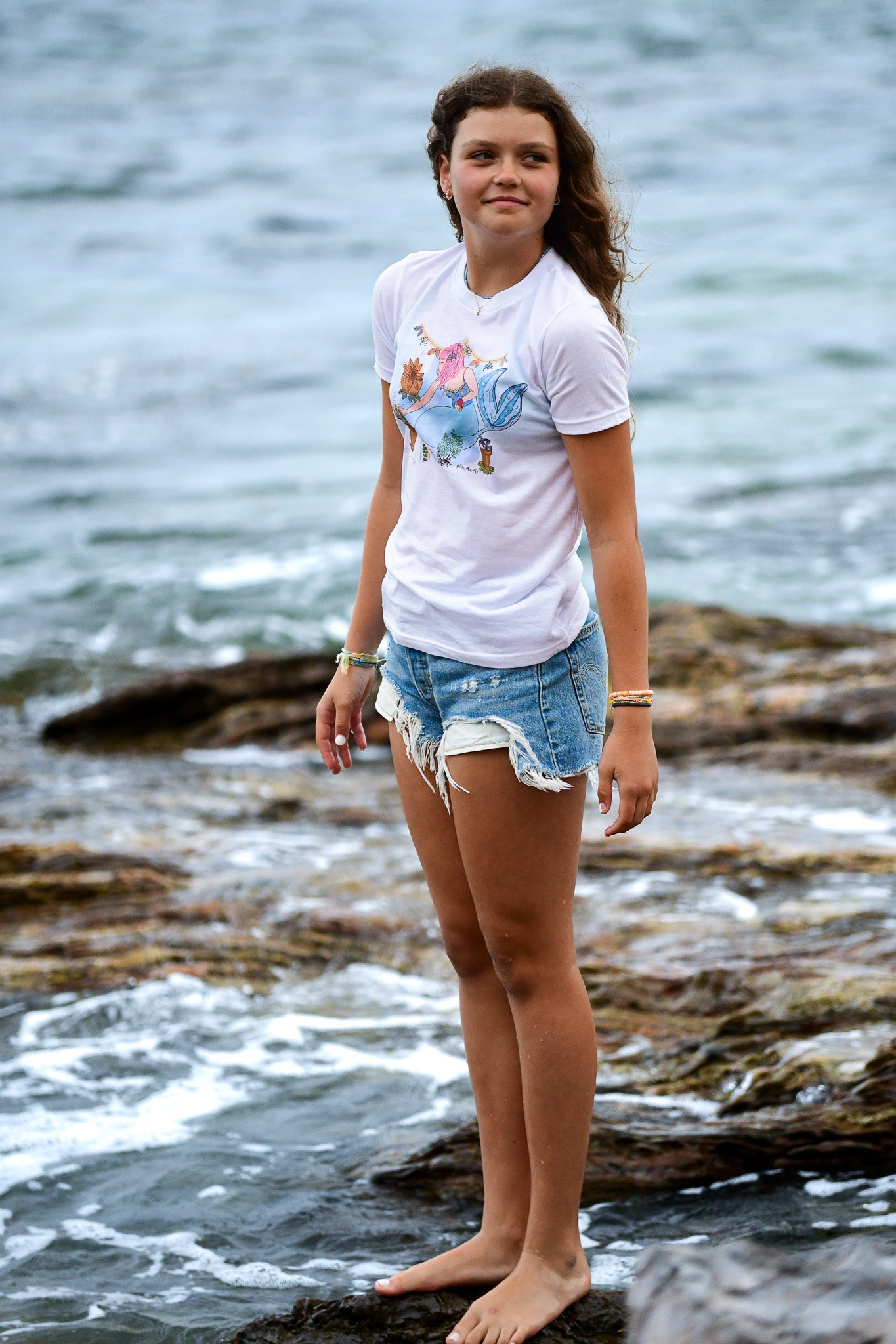 Load image into Gallery viewer, Mermaid graphic tee for a surfer girl or beach lover. Wearable art by Nadia Watts. 
