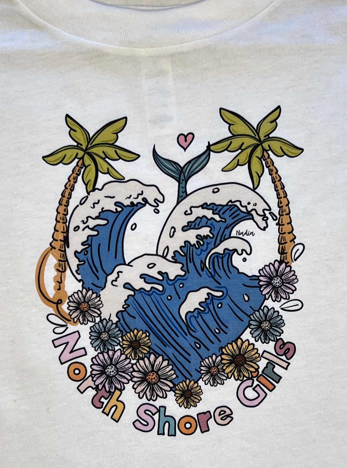 Wearable art by Nadia Watts. North Shore Girl graphic tee for surfer girls