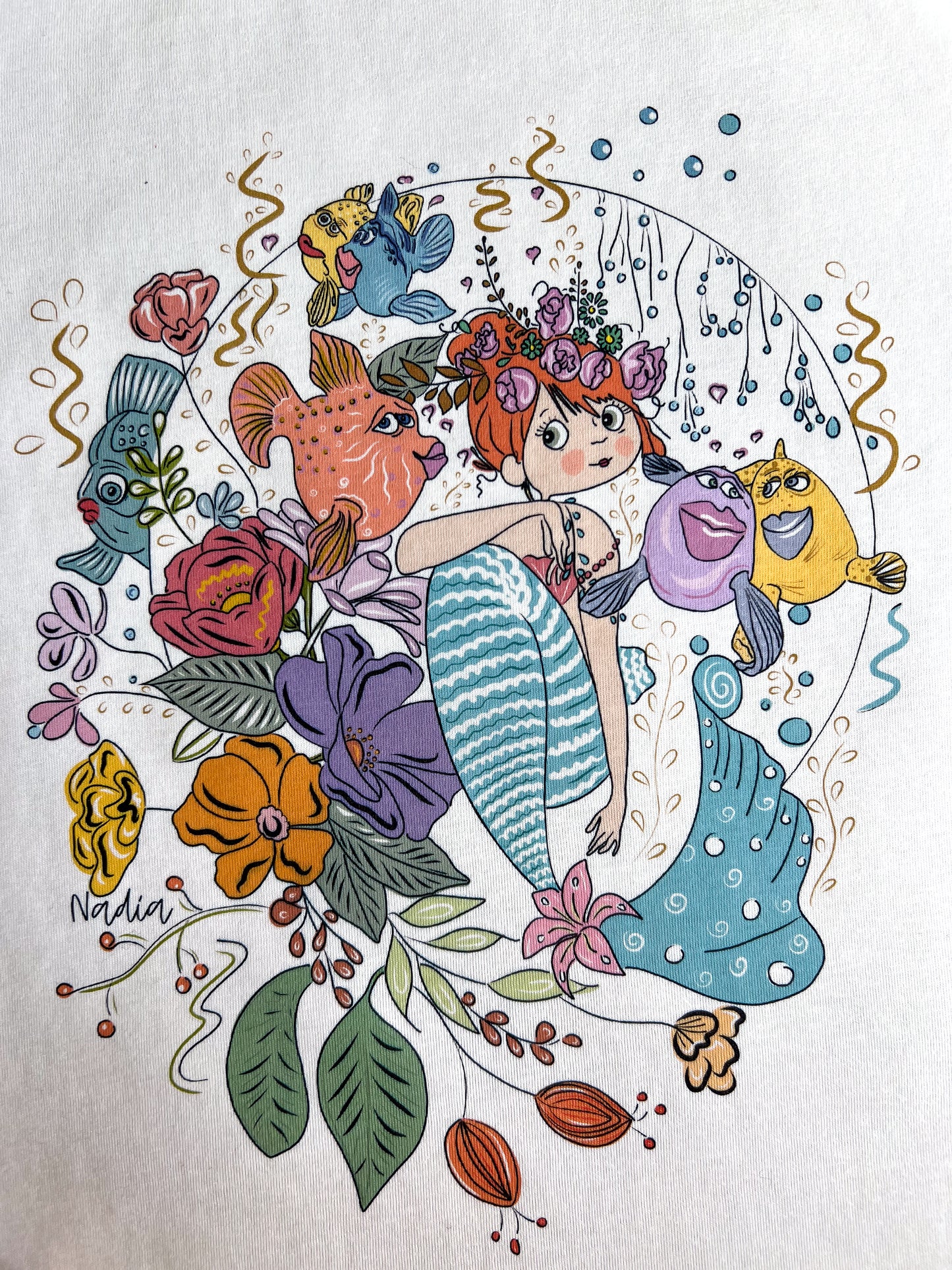 Mermaid and fish floral graphic t-shirt for women. Tee created by a local artist
