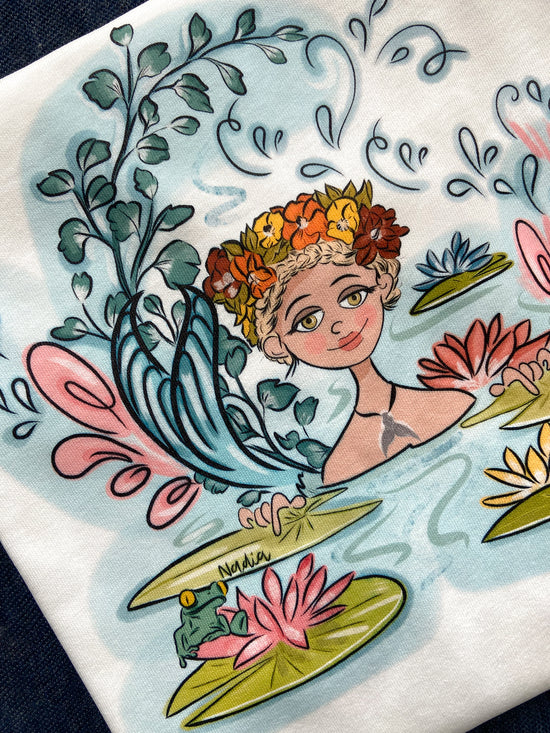 Load image into Gallery viewer, illustrated handmade graphic tee featuring mermaid among water lilies. North Shore Girls graphic tee collection

