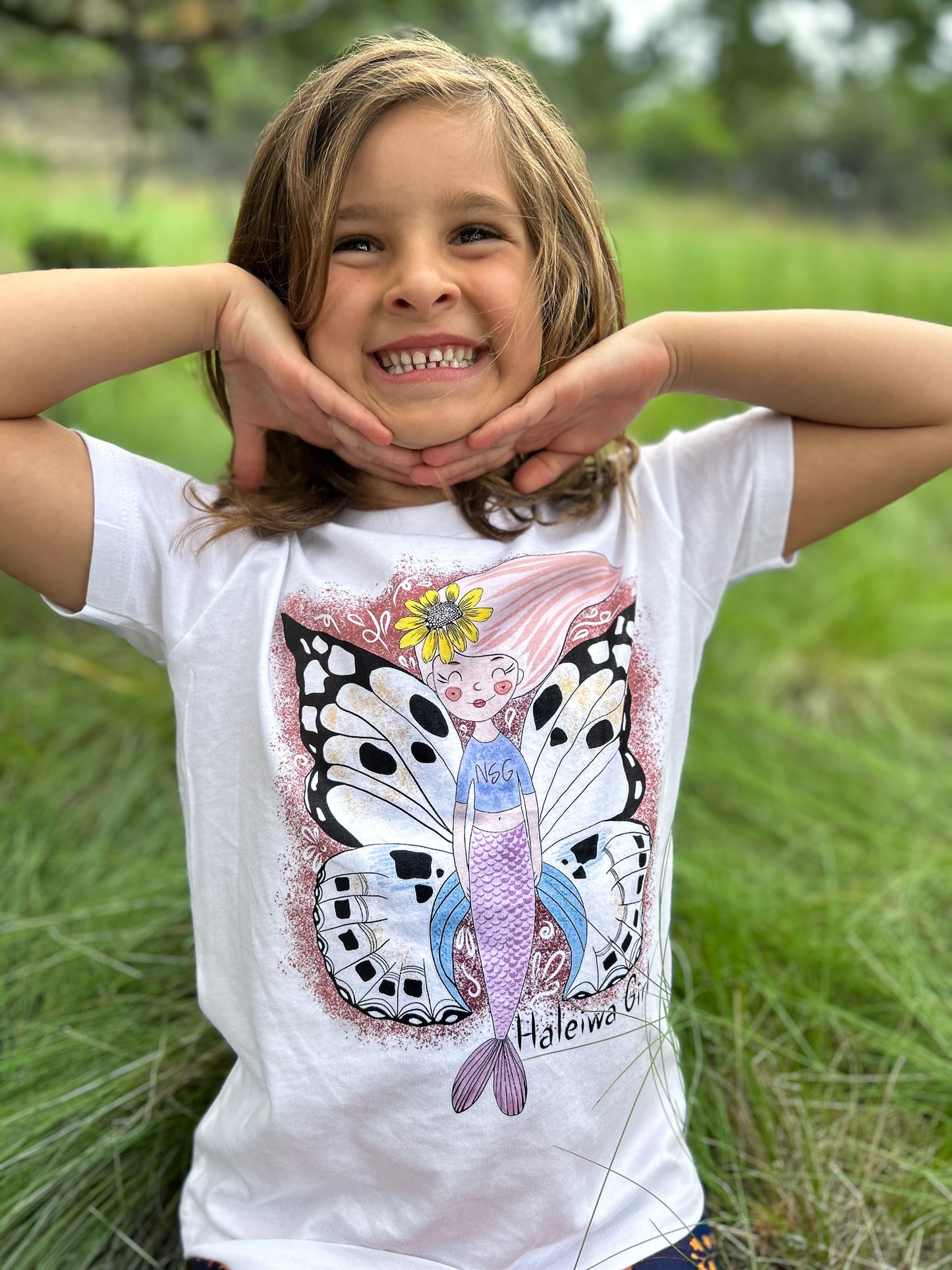 North Shore Girls Tee Collection for kids. Handmade in California Mermaid Haleiwa town mermaid butterfly. A perfect gift for the mermaid lover in your life.