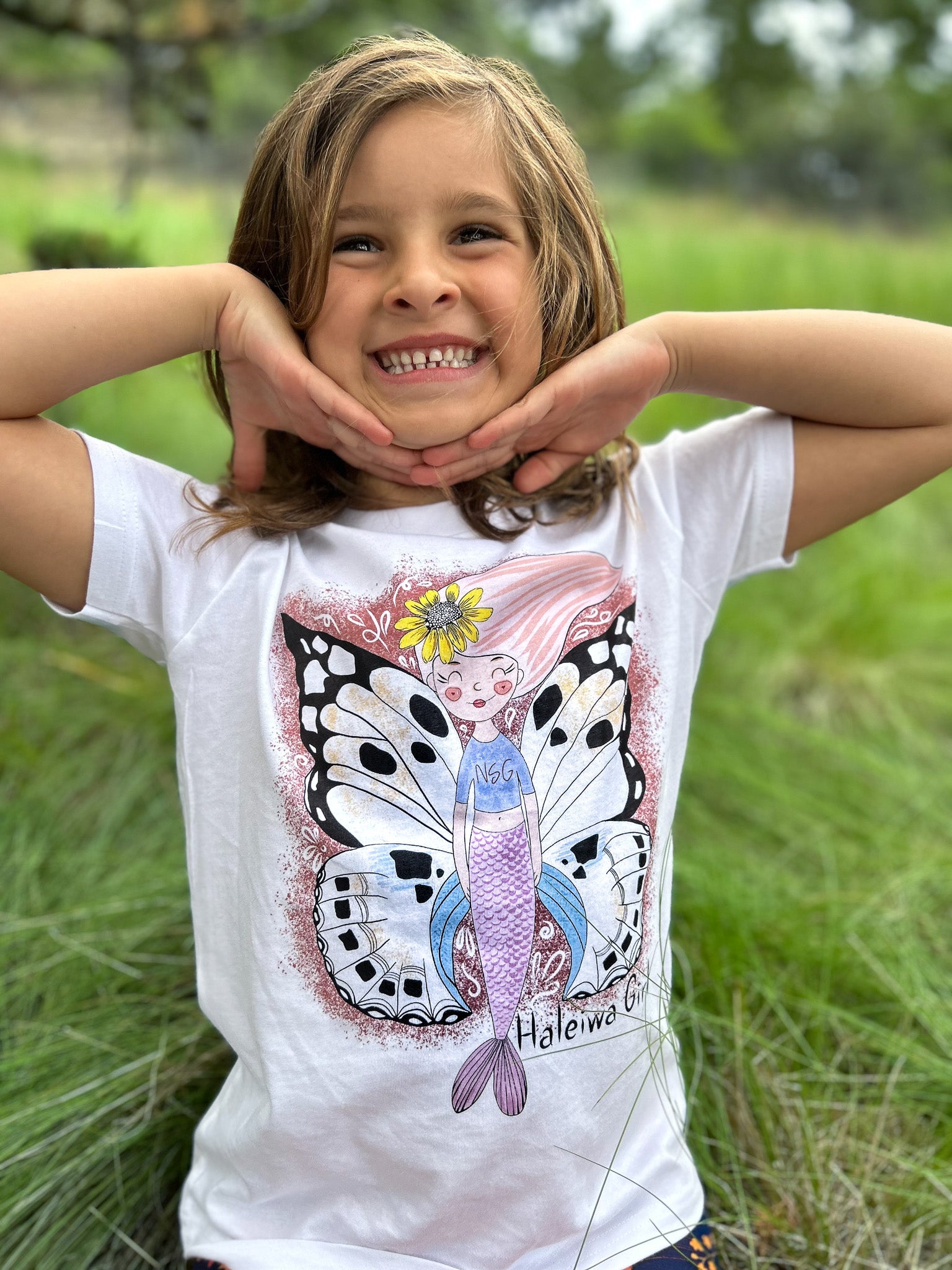 North Shore Girls Tee Collection for kids. Handmade in California Mermaid Haleiwa town mermaid butterfly. A perfect gift for the mermaid lover in your life.