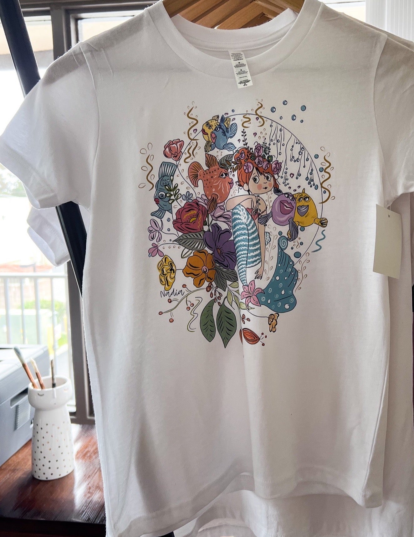 Load image into Gallery viewer, Floral sea creatures had-drawn graphic tee for girls
