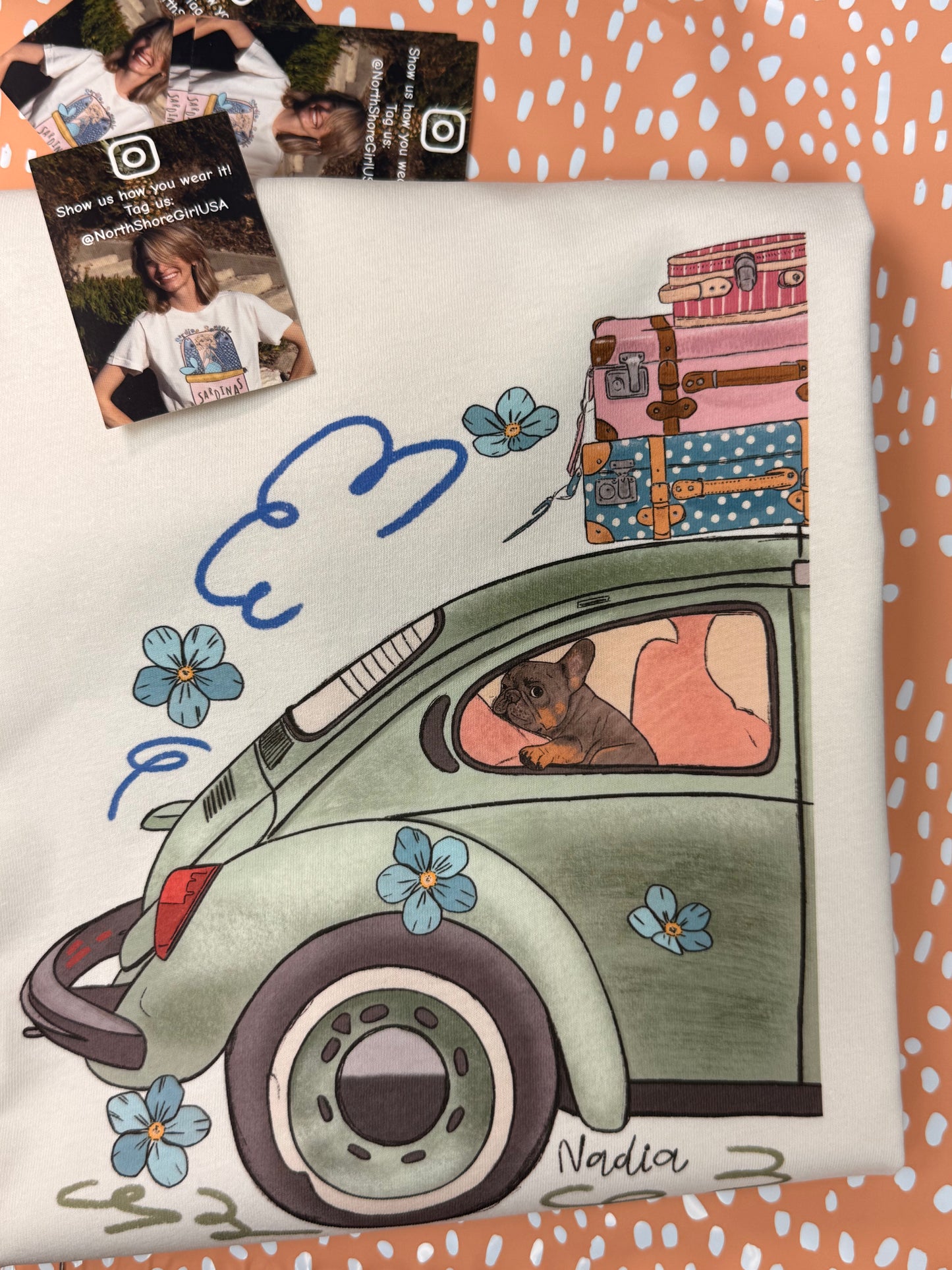North Shore Girls tee with an illustration of a green vintage car and a French Bulldog