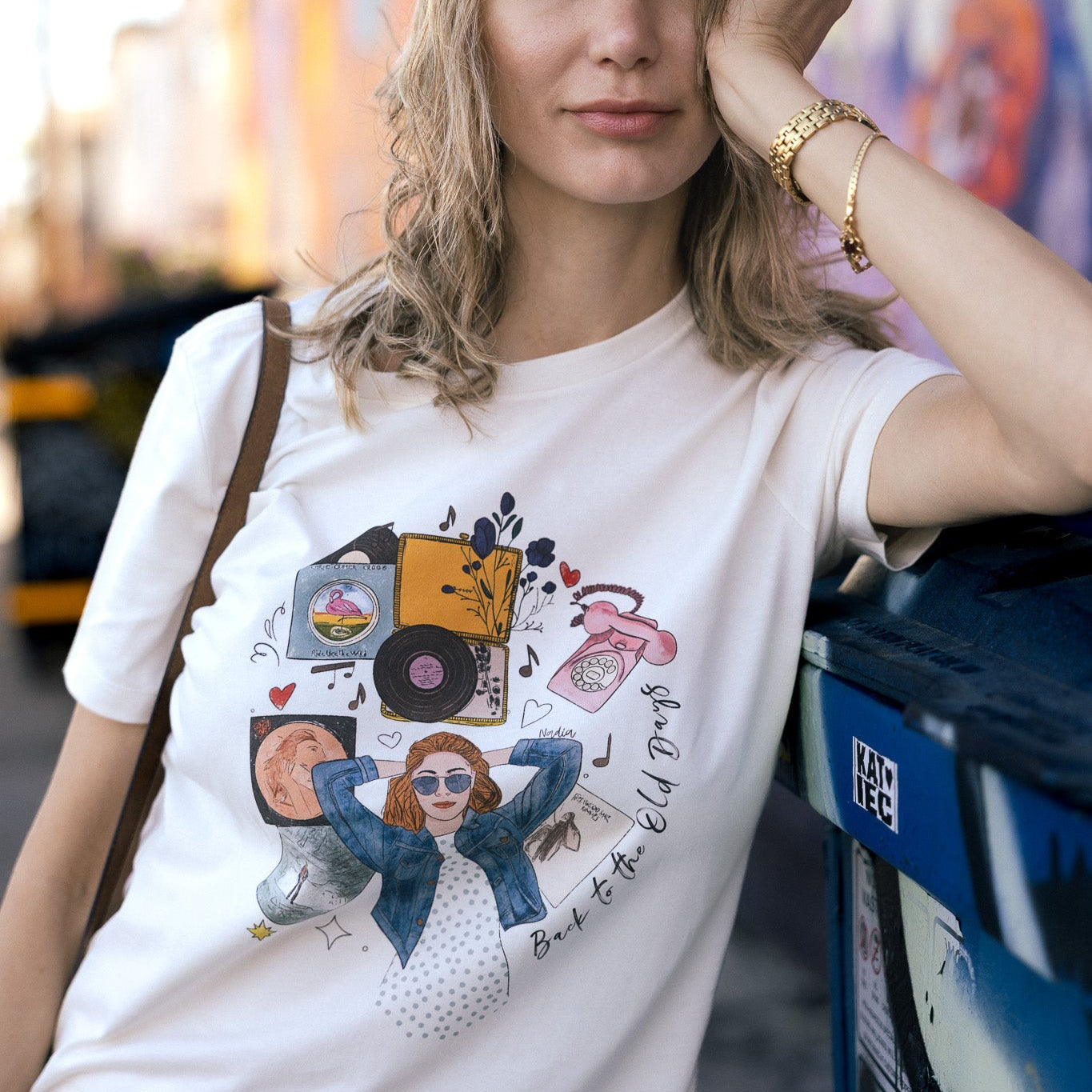 Women's off-white tee with hand-drawn retro music illustration and Back to the Old Days text.