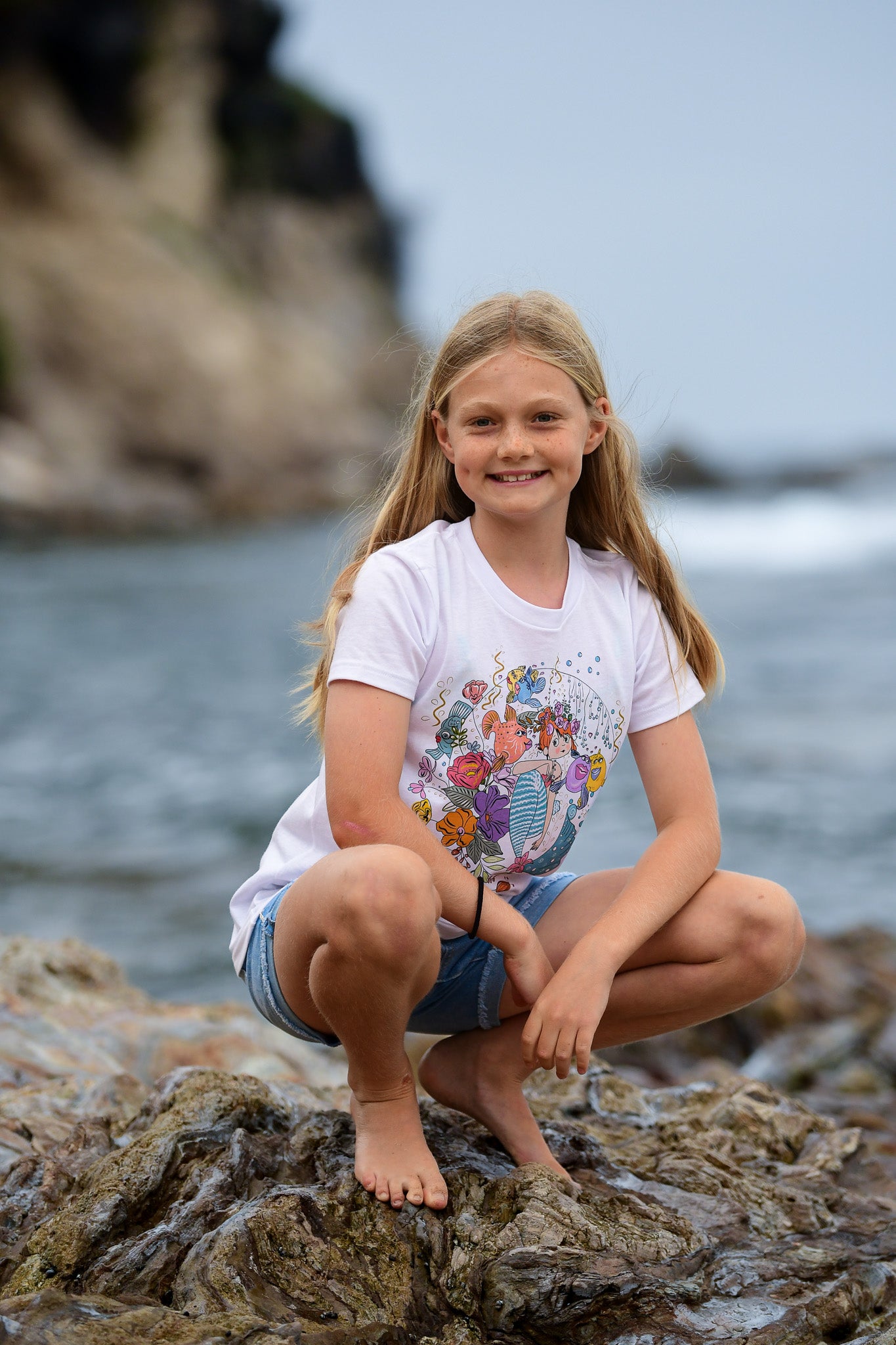 Floral mermaid graphic tee made by an artist for girls who enjoy the beach. NSG graphic tee collection