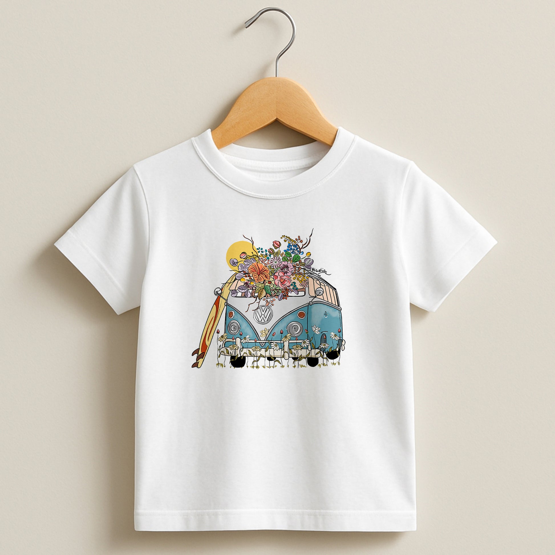 White toddler t-shirt featuring a hand-drawn vintage blue surf van with flowers and a surfboard, part of the North Shore Kids collection