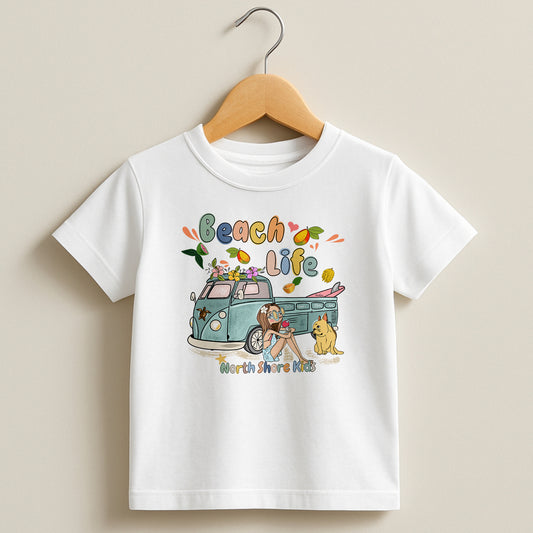 White toddler t-shirt featuring a hand-drawn surf girl with a surfboard in her van, a dog, and fruits, part of the North Shore Kids collection.