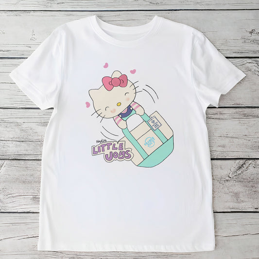 Youth white t-shirt featuring a hand-drawn character with a bow in a canvas tote bag, North Shore Girls brand.