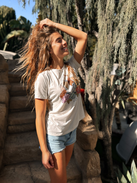 North Shore Girl model is wearing beach style  graphic tee